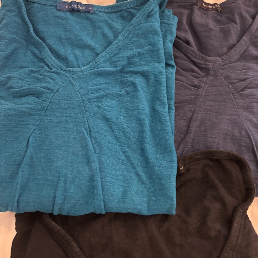 Three Cut Loose tee shirts. 1 black ,1 navy, 1 turquoise. Linen Never worn.